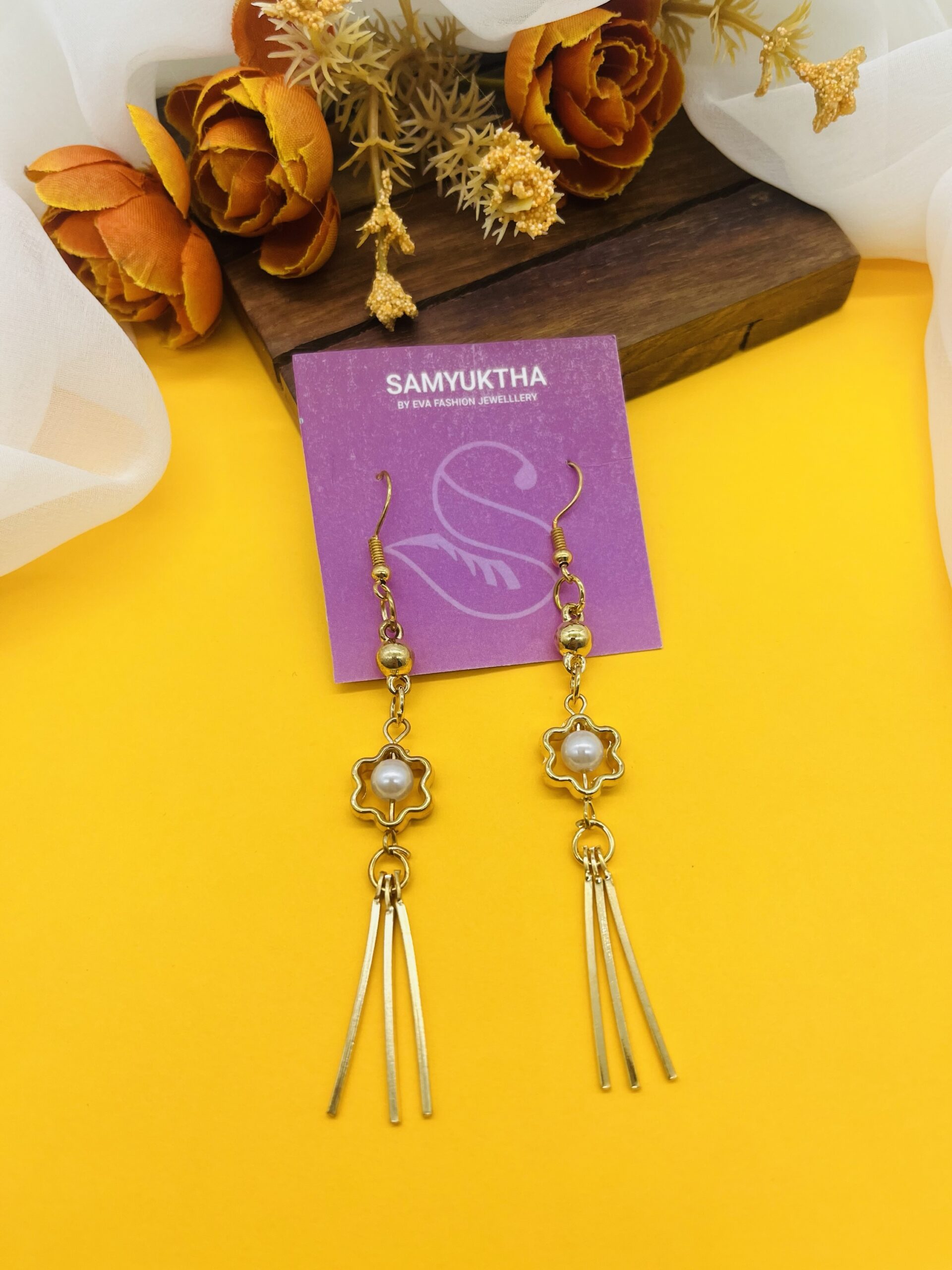 Floral dangler earrings with pearl