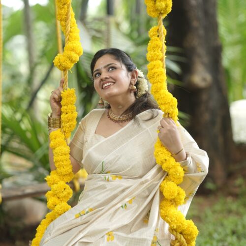 yellow floral printed kerala saree