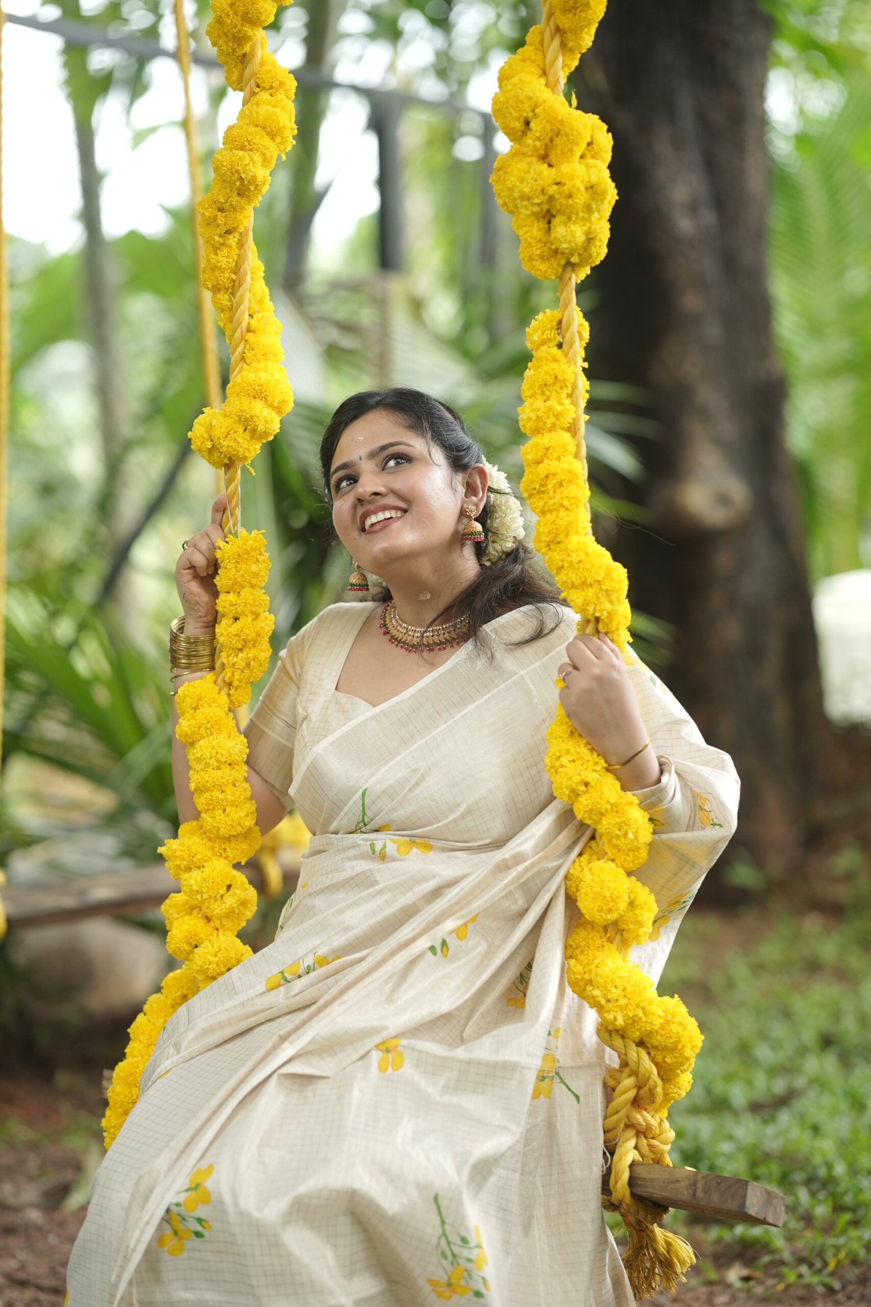 yellow floral printed kerala saree