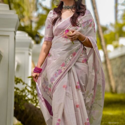 Traditional pink floral Kerala saree