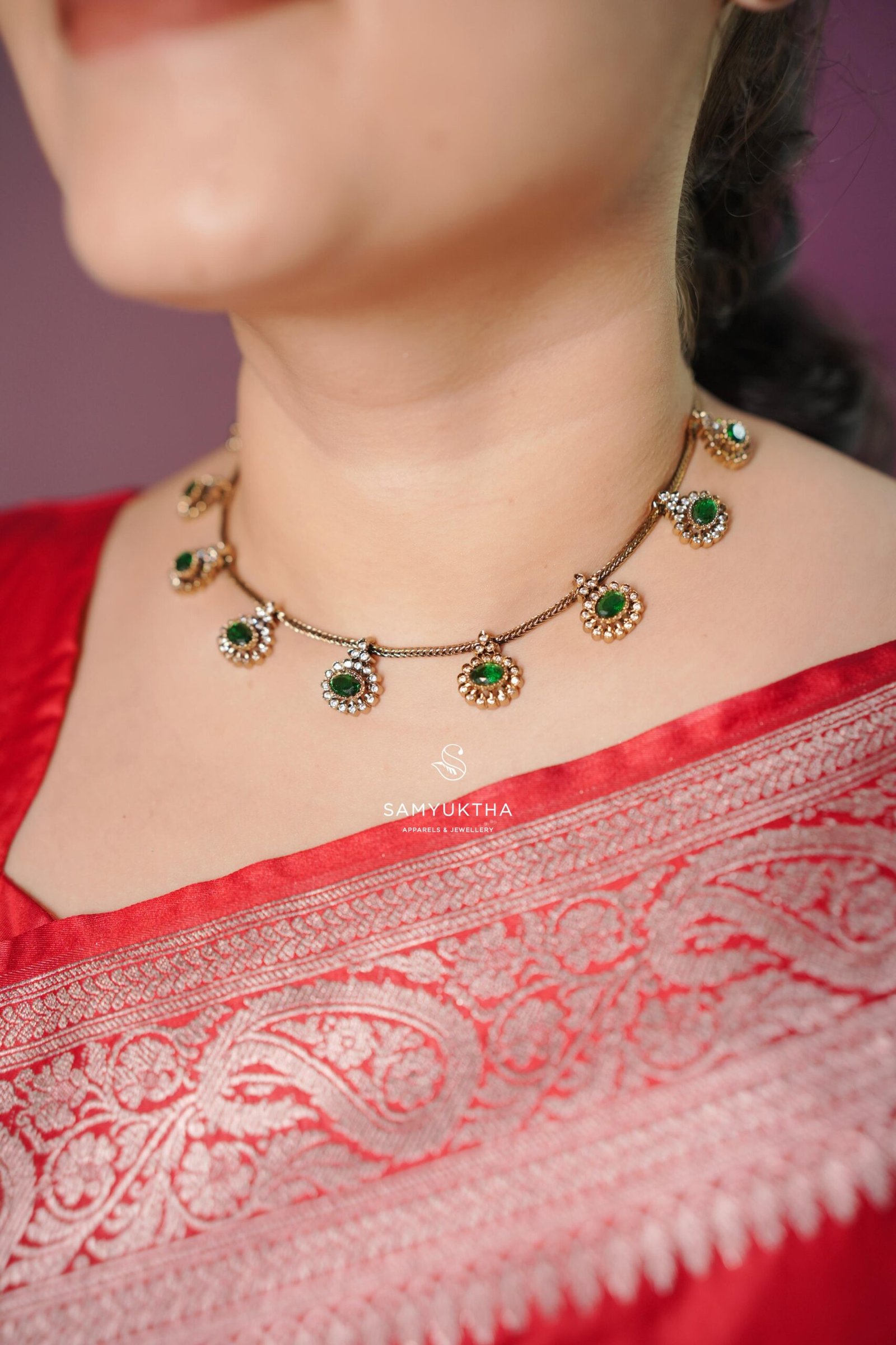 Emerald green and ruby gold-plated palakka motif choker necklace