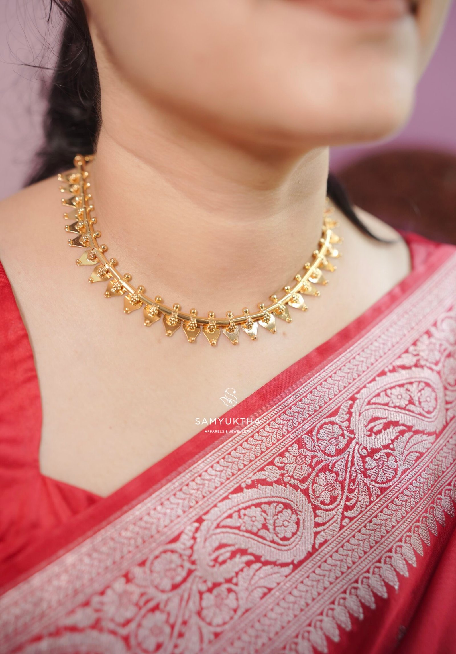 traditional Kerala heritage Thalikkoottam necklace.